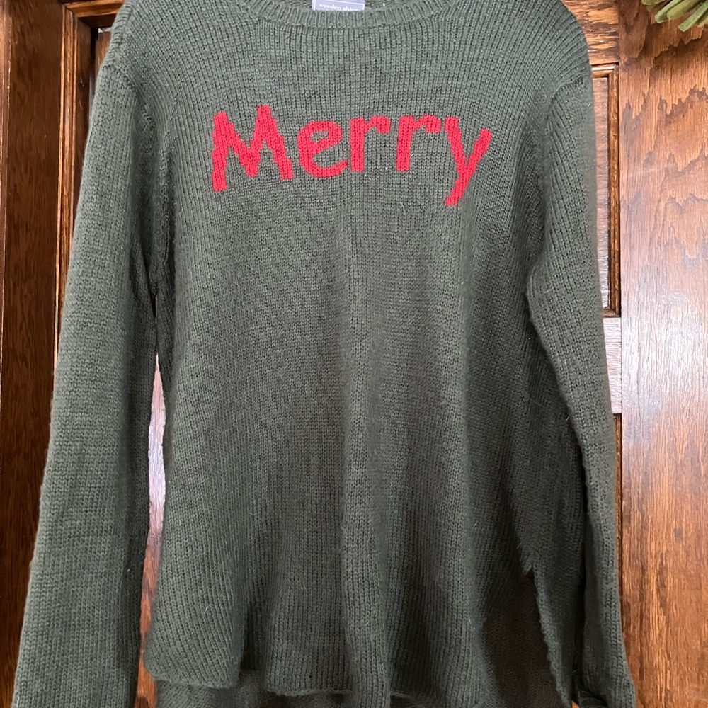 Wooden Ships Green Sweater with Red 'Merry' Text
